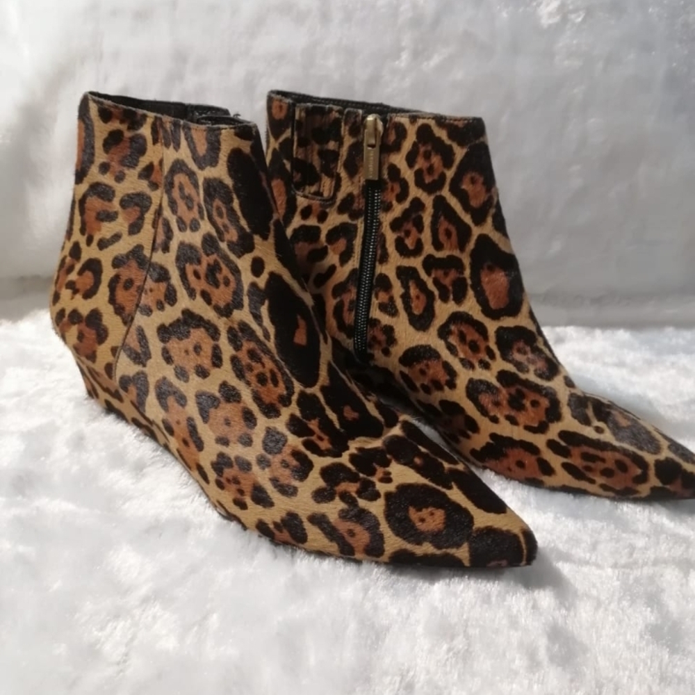 Calvin Klein Brown and Black Ankle Booties with Sleek Silhouette